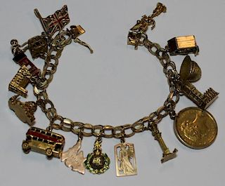 JEWELRY. 14kt Gold Charm Bracelet with 15 Charms.