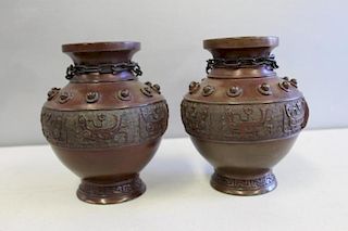 Pair of Bronze Asian Urns.