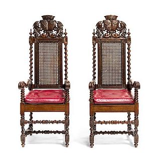 A Pair of Charles II Style Carved Armchairs, Height 53 inches.