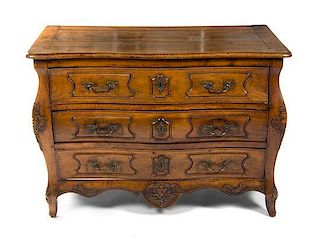 A Louis XV Provincial Walnut Commode, Height 34 x width 48 1/2 x depth 25 inches.