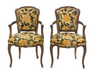 A Pair of Louis XV Style Fruitwood Fauteuils, Height 35 1/2 inches.