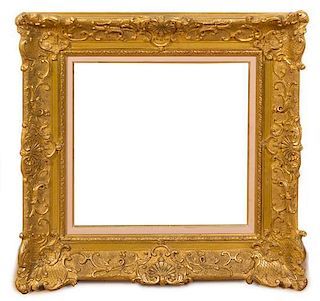 A Louis XV Style Giltwood Frame, Height 26 1/4 x width 25 1/2 inches.
