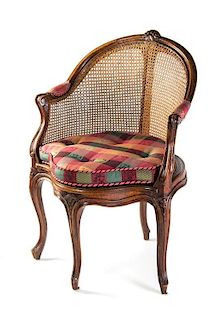 A Louis XV Caned Bergere, LATE 18TH/EARLY 19TH CENTURY, Height 35 inches.