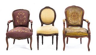 An Associated Pair of Louis XV Style Fauteuils, Height of tallest 36 inches.
