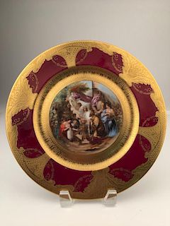 Limoges French portrait plate with gold enamel rim.