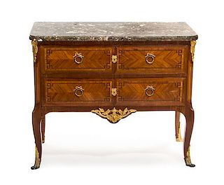A Louis XV Transitional Style Gilt Bronze Mounted Commode, FIRST HALF 20TH CENTURY, Height 35 x width 41 3/4 x depth 20 1/4 inch