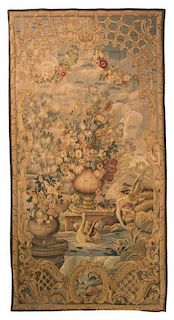 A Continental Wool Tapestry, CIRCA 1900, Height 8 feet 9 1/2 inches x width 4 feet 5 1/2 inches.