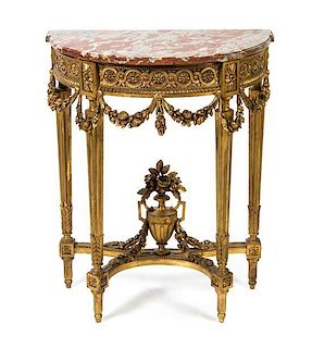 A Louis XVI Style Giltwood Console Table, 20TH CENTURY, Height 34 x width 27 1/2 x depth 15 1/2 inches.
