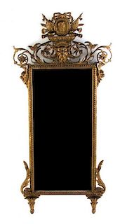A Louis XVI Giltwood Pier Mirror, Height 76 x width 36 inches.