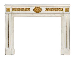 A French Style Gilt Bronze Mounted Marble Mantel, Width 57 inches.