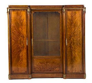 A Louis XVI Style Gilt Metal Mounted Mahogany Bibliotheque, Height 66 1/2 x width 69 x depth 18 1/2 inches.