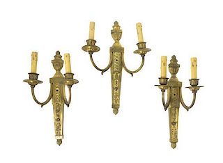 A Set of Three Louis XVI Style Gilt Bronze Two-Light Sconces, Height 15 3/4 inches.