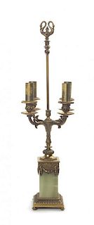 A Neoclassical Gilt Bronze and Onyx Four-Light Candelabrum, Height overall 27 1/2 inches.