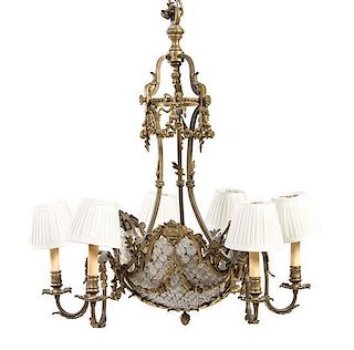 A Neoclassical Gilt Metal Six-Light Chandelier, Height 31 x diameter 25 inches.