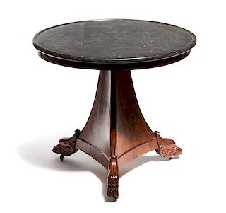 An Empire Mahogany and Marble Top Center Table, 19TH CENTURY, Height 28 3/4 x diameter 32 inches.