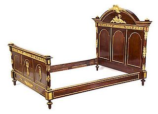 An Empire Style Gilt Bronze Mounted Mahogany Bed, FIRST HALF 20TH CENTURY, Height of headboard 60 x width 61 1/8 inches.