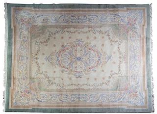 A Chinese or Indo-Aubusson Wool Rug, SECOND HALF 20TH CENTURY, 14 feet 11 inches x 12 feet.