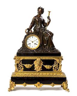 A Napoleon III Gilt and Patinated Bronze Figural Mantel Clock, Height 23 inches.