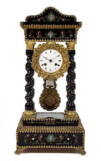 A French Ebonized and Pewter Inlaid Portico Clock, Height 20 7/8 inches.