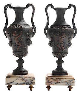 Pair of Metal Urns with Putti