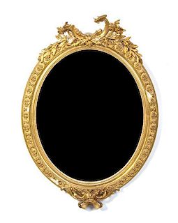 A French Giltwood and Composite Mirror, 20TH CENTURY, Height 54 x width 38 inches.
