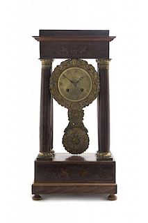 A French Marquetry Decorated Portico Clock, Height 20 inches.