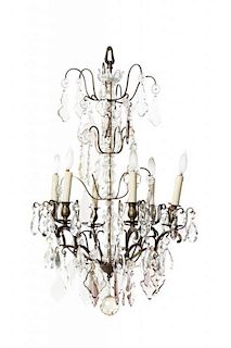 A French Brass Six-Light Chandelier, Height 35 x diameter 23 3/4 inches.