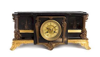 A French Aesthetic Movement Slate and Bronze Clock, 20TH CENTURY, Height 9 x width 18 inches.