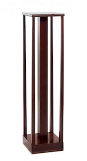 An Art Deco Mahogany Pedestal, Height 51 1/2 inches.