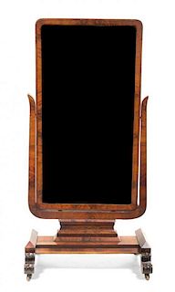 An Art Deco Mahogany Cheval Mirror, Height 62 x width 31 x depth 21 inches.