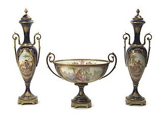 A Sevres Style Porcelain Three Piece Garniture, Height of urns 16 3/4 inches.