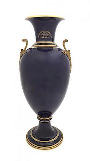 A Sevres Gilt Bronze Mounted Porcelain Urn, Height 27 inches.