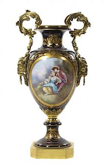 A Sevres Style Gilt Bronze Mounted Porcelain Urn, Height overall 38 inches.
