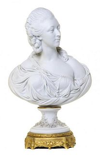 A Sevres Style Gilt Bronze Mounted Bisque Porcelain Bust, Height 19 inches.