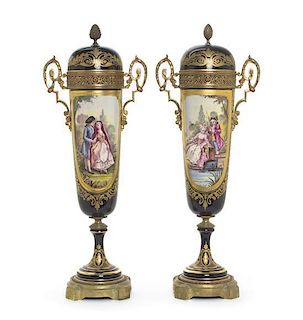 A Pair of Sevres Style Gilt Bronze Mounted Porcelain Urns and Covers, LATE 19TH CENTURY, Height 21 1/4 inches.