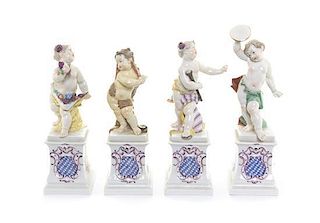 A Set of Four Nymphenburg Porcelain Figures, Height of first 7 7/8 inches.