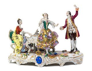 A German Porcelain Figural Group, Width 15 inches.