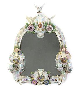 A German Porcelain Girandole Mirror, Height 25 1/4 x width 20 inches.