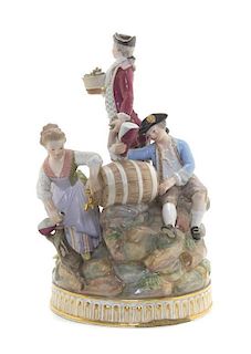 A Meissen Porcelain Figural Group, Height 9 1/8 inches.