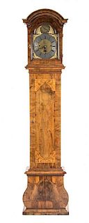 A German Marquetry Inlaid Walnut Tall Case Clock, Height 91 1/2 inches.