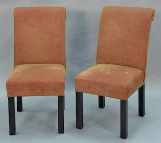 Set of six upholstered dining chairs.