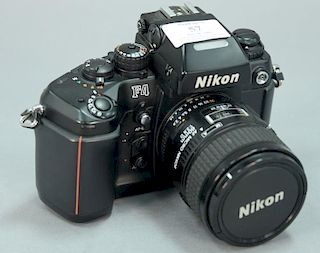 Nikon F4 (2459335) with AF Micro Nikkor 60/2.8D and MF-22 back.
