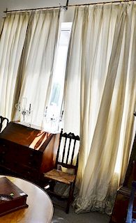 Pair of custom tan silk drapes, lined curtains, window or door treatment. approximate measurements: lg. 120in., wd. 139in. ea