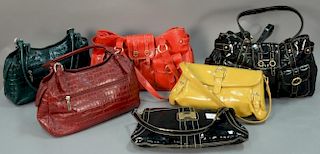 Six Maxx New York leather handbags, all with original dust covers.