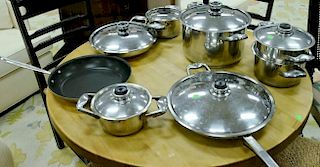 Set of thirteen Professional Platinum Cooking System pots and pans, stainless.