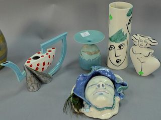 Five ceramic pieces to include Jillian Barber ceramic mask with peacock feather (ht. 9 1/2in., wd. 8 1/2in.), two Picasso sty