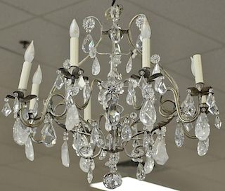 Eight light chandelier having rock crystal and crystal prisms. ht. 24in., dia. 30in.