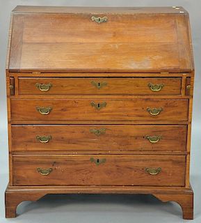 Walnut Chippendale desk having slant front over four drawers set on bracket base, 18th century. ht. 40in., wd. 36in., dp. 19i