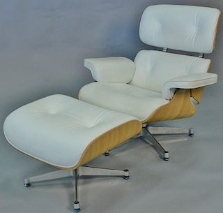 Eames style chair and ottoman.