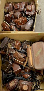Two large boxes of camera cases, Contaflex, Retina, Contax, Balba, and more.
